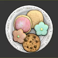 Colorful Decorated Cookies On Ceramic Plate With Sugar Flowers And Chocolate Chips