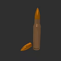 Military Bullet With Brown Body And Orange Tip On Dark Background