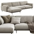 Light Gray Modern Sectional Sofa With Decorative Pillows And Brown Blanket 3d model