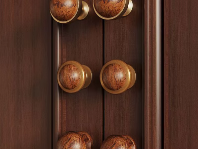 Wooden Cabinet Door Knobs With Gold Metal Accents On Dark Wood Surface 3d model