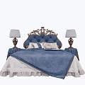 Elegant Carved Headboard Double Bed With Blue Quilt White Sheets And Bedside Table Lamps