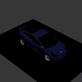 Blue Tesla Electric Sedan With Modern Sleek Design And Alloy Wheels