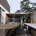 Modern Garden Landscape With Stone Pathway Water Pool Greenery And Building Reflections