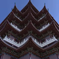 Traditional Chinese Multi Tiered Tower With Ornate Eaves Red Roofs And White Railings