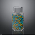 Colorful Blue And Yellow Candy Pieces In Clear Glass Bottle With White Lid