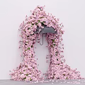 Pink Flower Adorned Umbrella Photo Spot With Cascading Blooms And Scattered Petals On Ground