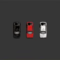 Three Small Car Models in Black Red White Colors Displayed on Shiny Reflective Surface