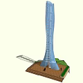 Modern Blue Glass Tower Featuring Sleek Structure And Green Base Design 3d model