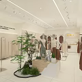 Modern Clothing Store with Mannequins Displaying Dresses and Green Plants in Neat Layout