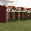 Outdoor Red and White Striped Canopy Structure with Metal Ladders Green Grass Field Cloudy Sky