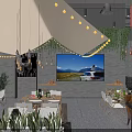 Modern Restaurant Interior With Chefs At Counter String Lights Greenery Wall And Wooden Furniture