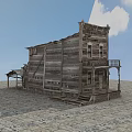 Old Western Wooden Building With Balcony Stairs And Stone Ground Under Blue Sky