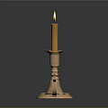Antique Brass Candle Lamp With Lit Yellow Candle And Decorative Reflective Base