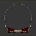 Vintage Brass Frame Goggles With Red Headband And Blue Lenses On Black Surface