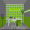 Public Office Space With Green Grid Pattern Wall Manifest Lettering White Round Table And Laptop