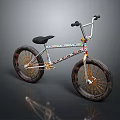 Colorful Frame BMX Bicycle With Black Seat Handlebars And Gold Spokes Textured Tires