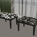 Two Stools With Black And White Floral Upholstery Dark Wooden Legs In Room Setting