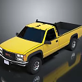 Yellow GMC Pickup Truck With Black Bed Front Grille And Off Road Wheels