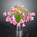 Beautiful Pink Bell Shaped Flowers Arranged In Silver Vase On Dark Background