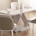 Modern White Dining Table Set With Beige Chairs Vase And Books On Wooden Floor