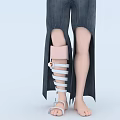 Man In Jeans With Split Leg Design Featuring Pink Knee Pad And White Straps