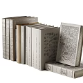 Stacked Books Featuring Modern Design Covers With Neutral Tones And Geometric Patterns