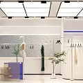 Modern Clothing Store Interior With Mannequin Clothes Hangers And Green Plants