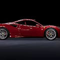 Red Ferrari Sports Car With Sleek Aerodynamic Design And Shiny Alloy Wheels