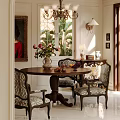 Classic Restaurant Dining Space With Round Wooden Table Patterned Chairs Vase Flower Bouquet And Framed Painting