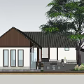 Traditional Chinese House Featuring Classic Tiled Roof Wooden Door Carved Windows and Green Plants