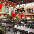 Cozy Restaurant Interior With Red Lanterns Large Decorative Painting Red Brick Walls And Green Plants