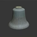 Vintage Bronze Bell With Intricate Carved Patterns On Decorative Surface