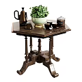 Dark Wooden Side Table with Carved Legs Green Plant Black Teapot Cups and Lidded Jar