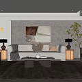 Modern Neutral Toned Living Room With Comfy Sofa And Round Marble Coffee Table And Tasteful Decor