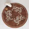 Brown Round Rug With Intricate White Dragon Patterns And Decorative Border 3d model
