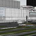 Modern Commercial Street With Tall Buildings Green Spaces And Urban Roads