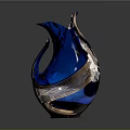 Artistic Blue Glass Vase With Unique Curved Shape And Intricate Carving Details