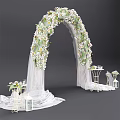 Decorative Event Entrance Arch With White Flowers Greenery White Drapes Small Tables And Lanterns