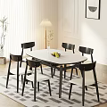 Minimalist Dining Table And Chairs Set With Oval White Tabletop Black Chairs And White Seats