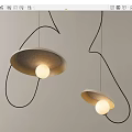 Modern Pendant Lights With Curved Black Wires Disc Shaped Shades And Round Illuminated Bulbs