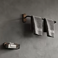 Gray Wall Bathroom Accessory Setup With Mounted Towel Rack Gray Towels And Soap Dish