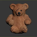 Brown Stuffed Teddy Bear With Stitched Details Sitting On Dark Background