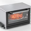 Stainless Steel Electric Toaster Oven With Roasted Chicken And Control Panel