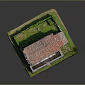 Ancient Church Model With Red Tile Roof Tower And Stone Walls On Green Grass Base