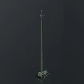 Green Utility Vehicle Parked at the Base of Tall Metal Tower Structure