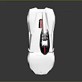 Silver Open Top Sports Car with Sleek Design Red Interior and Reflective Surface