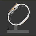 Luxury Wrist Watch Featuring Blue Dial Golden Strap On Transparent Display Stand With Price Tag