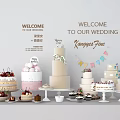 Delicious Assorted Wedding Desserts With Layered Cakes Fresh Fruit And Decorative Flags