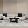 Beige Sofa With Dark Blue Cushions And Black Coffee Table In Modern Living Room