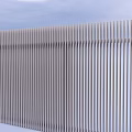Modern Sleek Metal Railings Featuring Vertical Slats and Sectioned Design on Blue Background